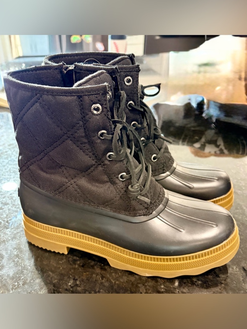 Sperry Black Quilted Duck Boots with Tan Outsole Accent